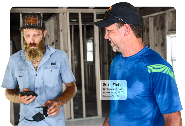 pest control worker spraying cabinet